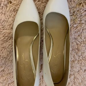 White Jessica Simpson Pumps. Good condition. Worn a couple of times. Very cute!